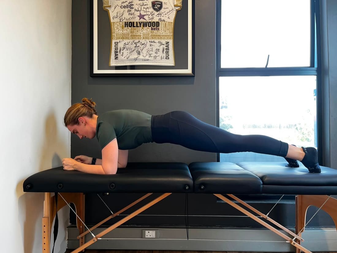 Hannah demonstrating a proper plank position